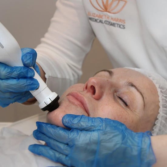 Elizabeth Harris performing a treatment on a patient at her Cosmetic Clinic in Cowes on the Isle of Wight.
